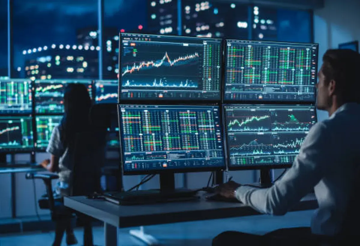 Commodity traders analyzing oil market data.