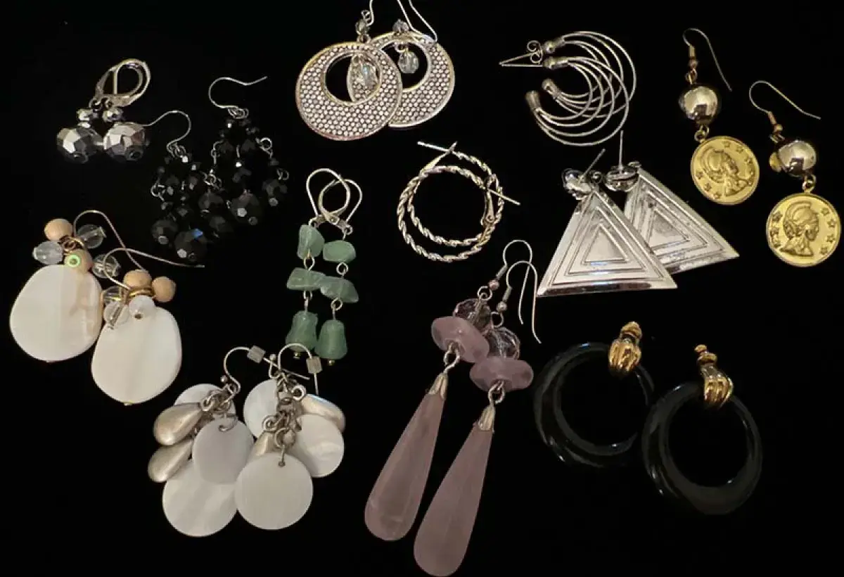 Collection of earrings representing styles from different cultures
