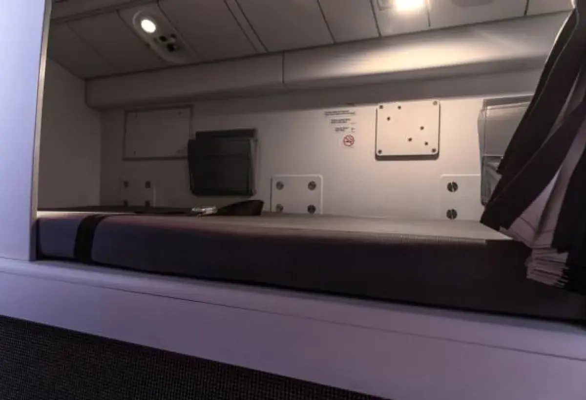 Hidden crew sleeping compartment inside aircraft