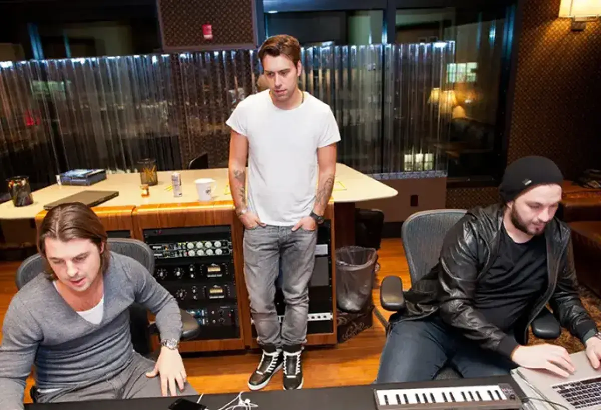 Swedish House Mafia creating progressive house music in studio