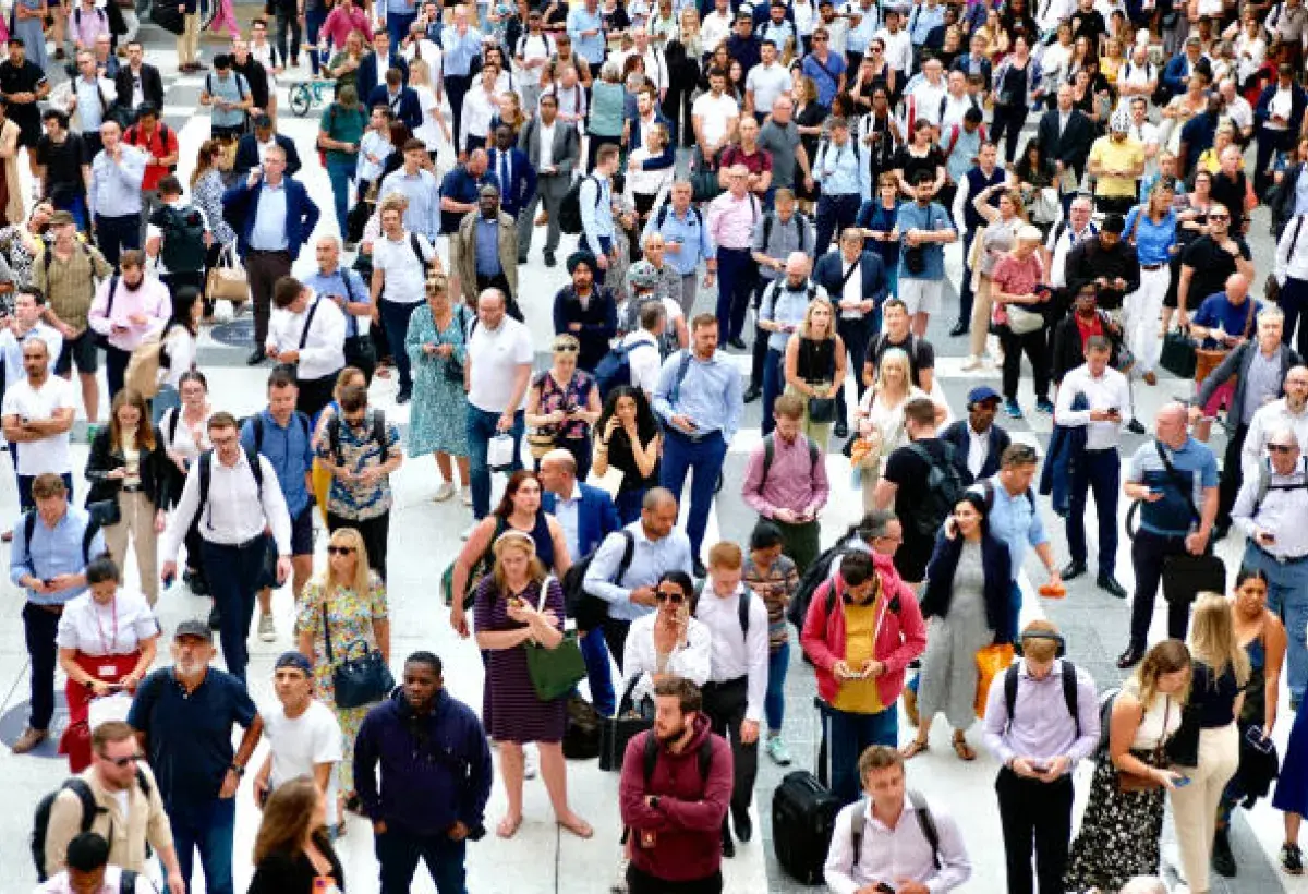 People using mobile phones in urban and rural settings