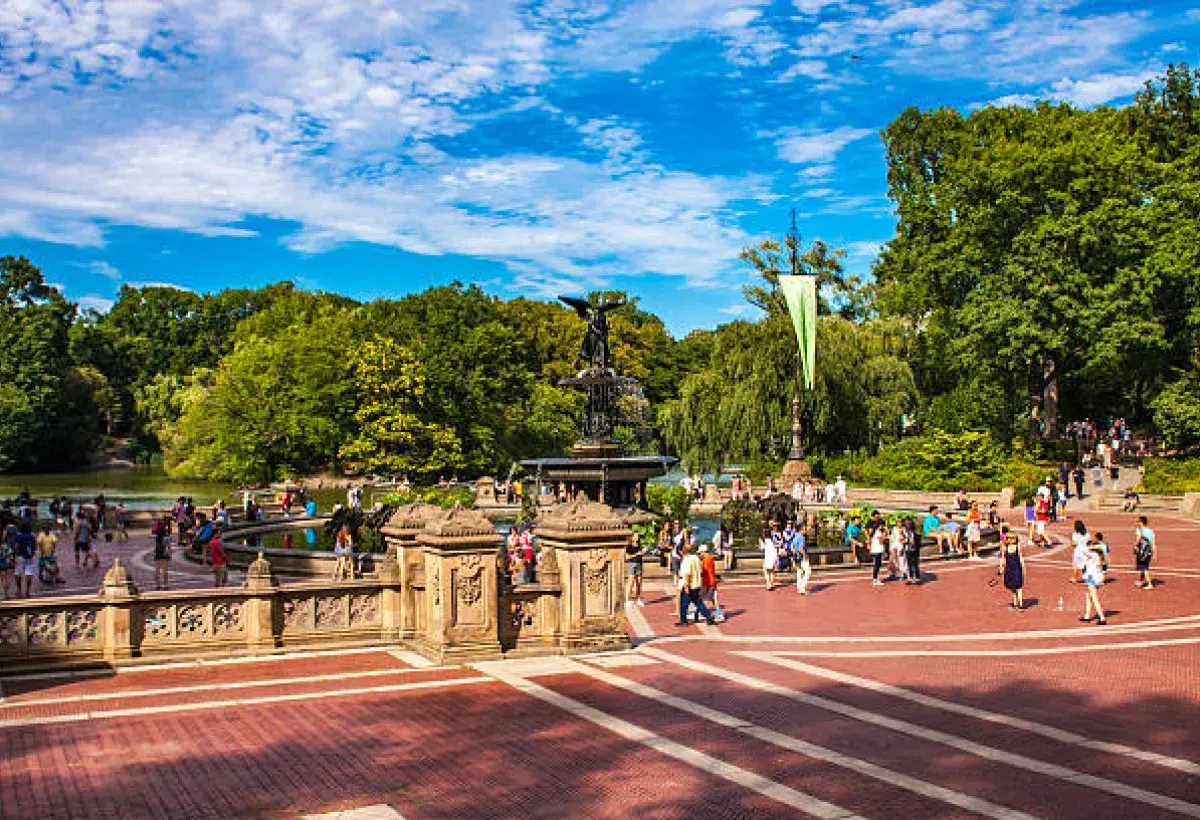 Tourists walking near Bethesda Terrace in Central Park