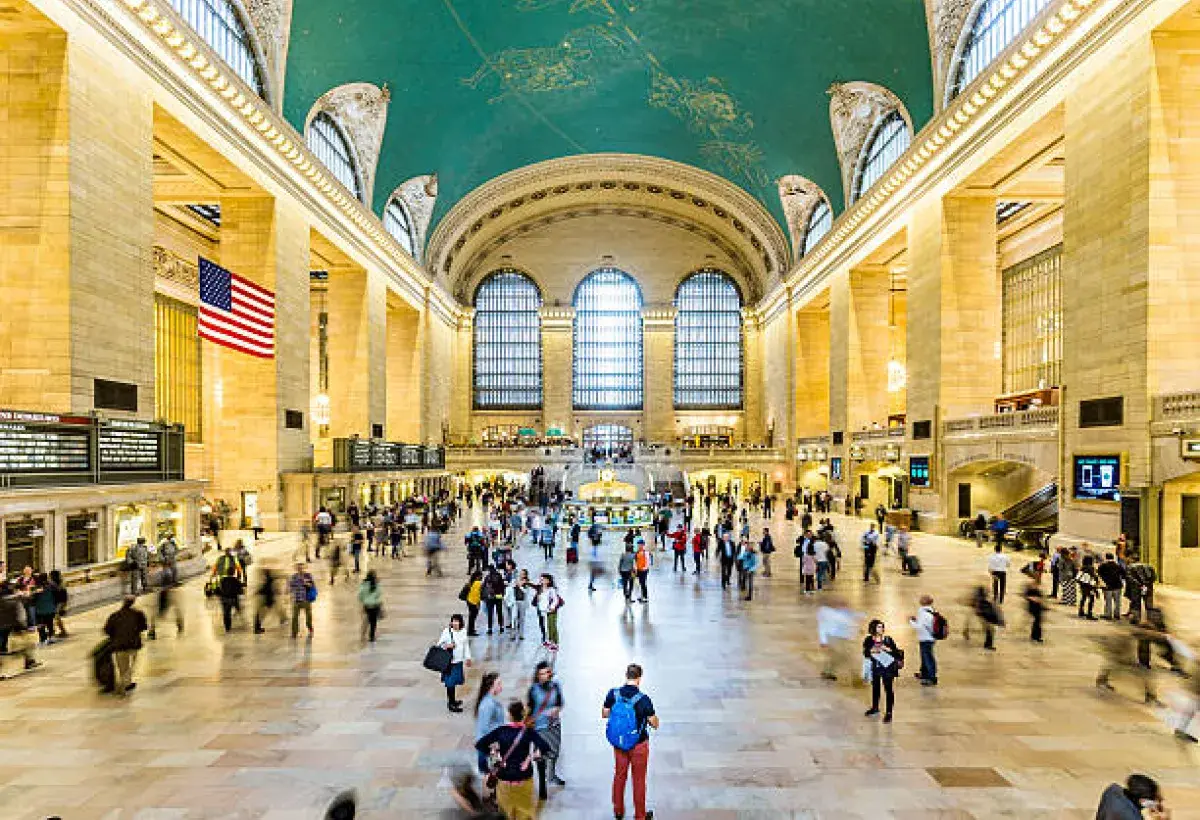 People walking through the main concourse of Grand Central Terminal