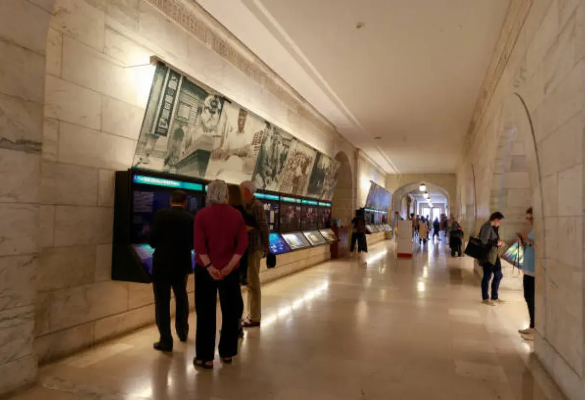 Visitors exploring artwork in a New York City museum