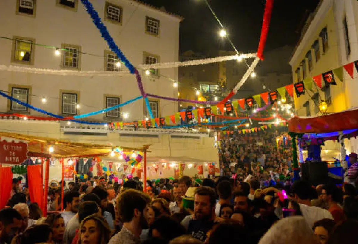 Street festival celebrating sardines with music and grilling