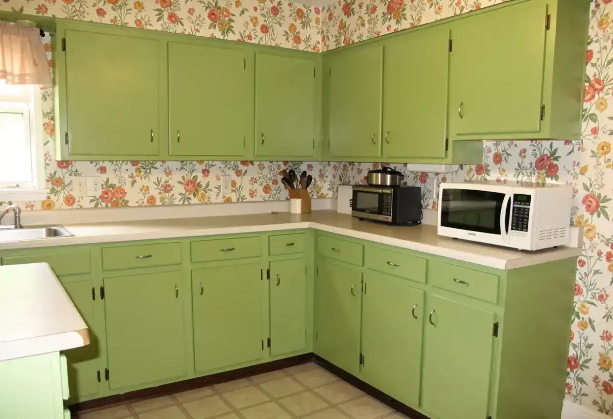 1970s kitchen with microwave on the counter