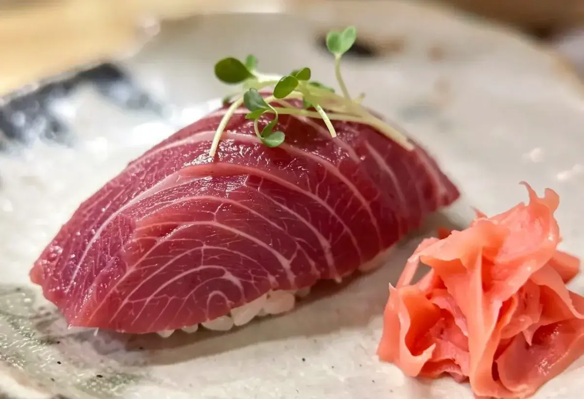 Otoro tuna nigiri with visible marbling