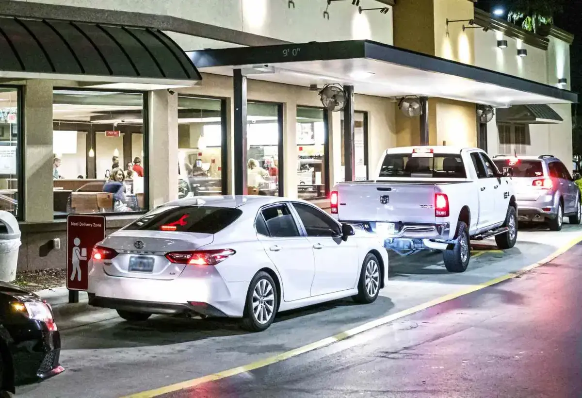 Cars waiting in drive-through at American restaurant