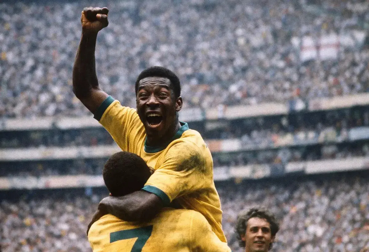 Pelé celebrating during a World Cup match