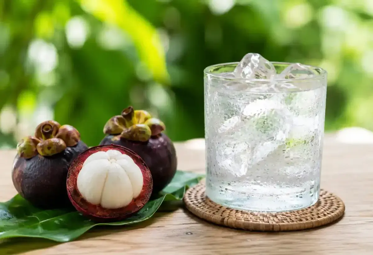 Refreshing Mangosteen Fruit Served with Cold Water and Ice