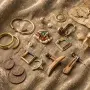 A diverse collection of earrings from different eras and cultures arranged on velvet, symbolizing their rich history, symbolism, and enduring appeal.
