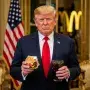 President Trump holding a Big Mac and Diet Coke with American flag backdrop